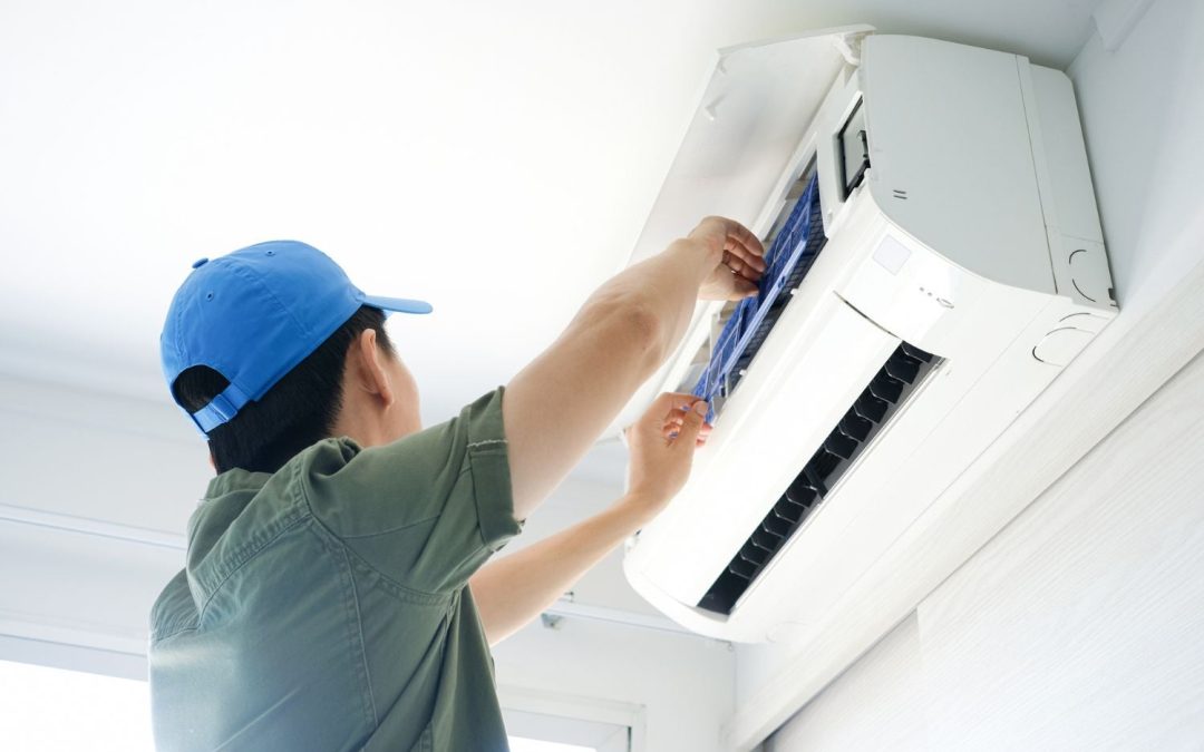 HVAC technician servicing a ductless mini split in Santa Monica
