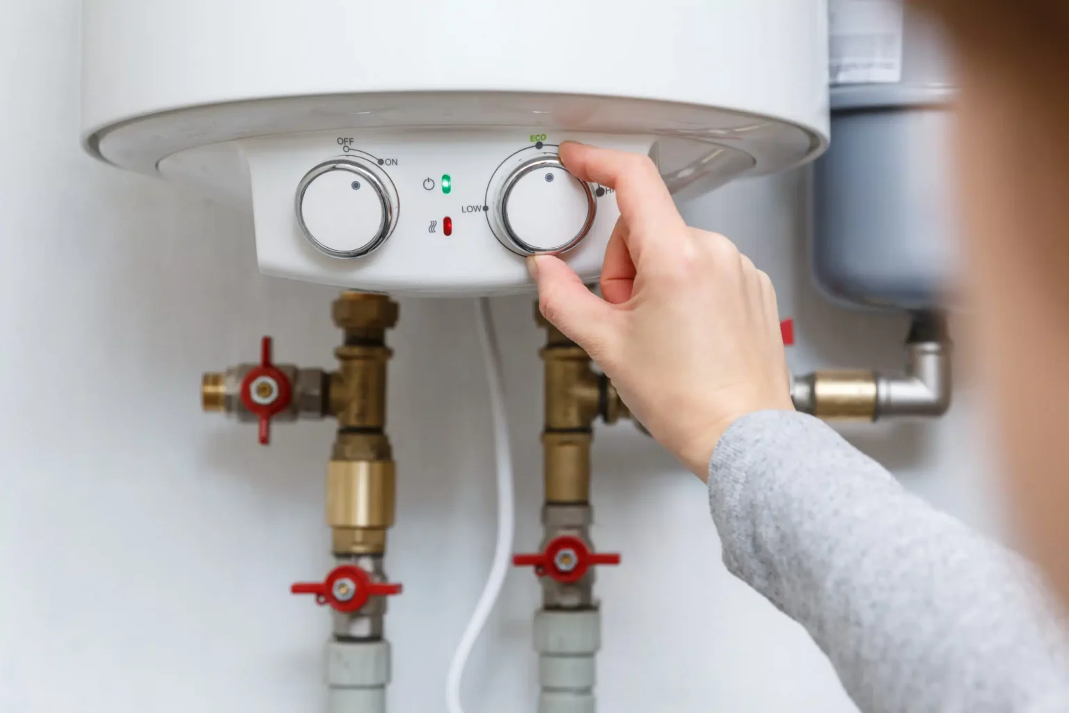 Technician adjusting a water heater in Santa Monica